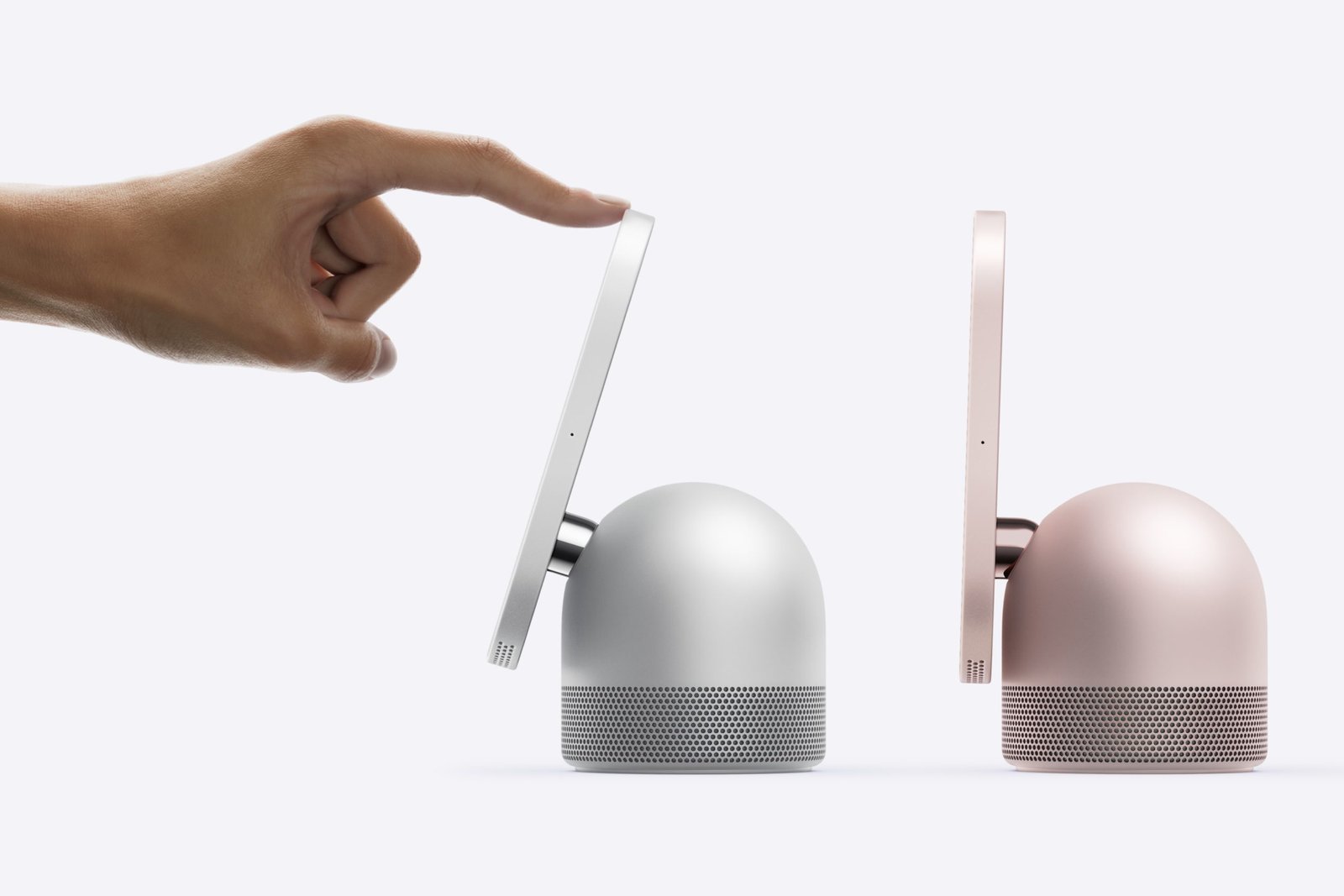 A person touches the HomeView screen and tilts it on its hinge