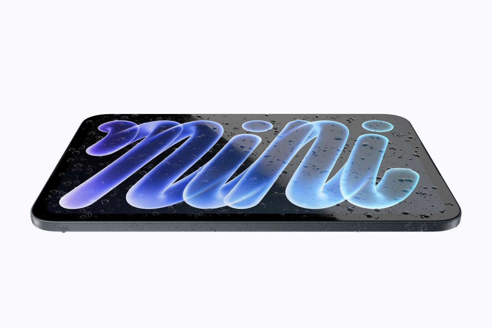 The iPad mini lying flat with water droplets on its screen, which Apple shows to illustrate the IP67 rating